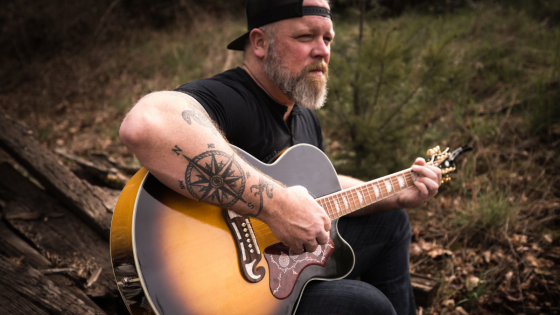 Jeremy McKern playing guitar